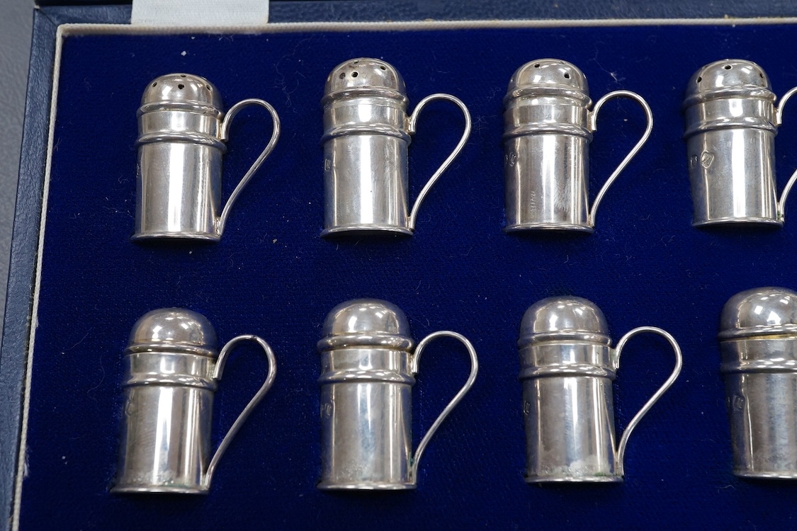 A modern cased set of twelve Mappin & Webb silver single handled condiments, J A Campbell London, 1986, 30mm.